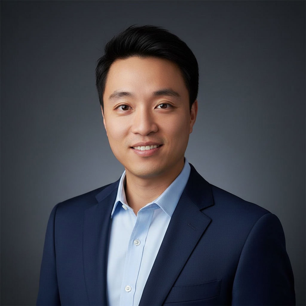 Young professional man in dark suit for business or corporate portrait.