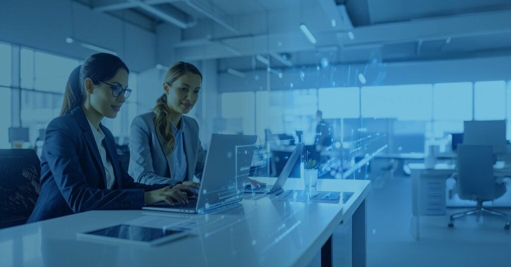 Innovative technology team working in modern office with digital interface elements.