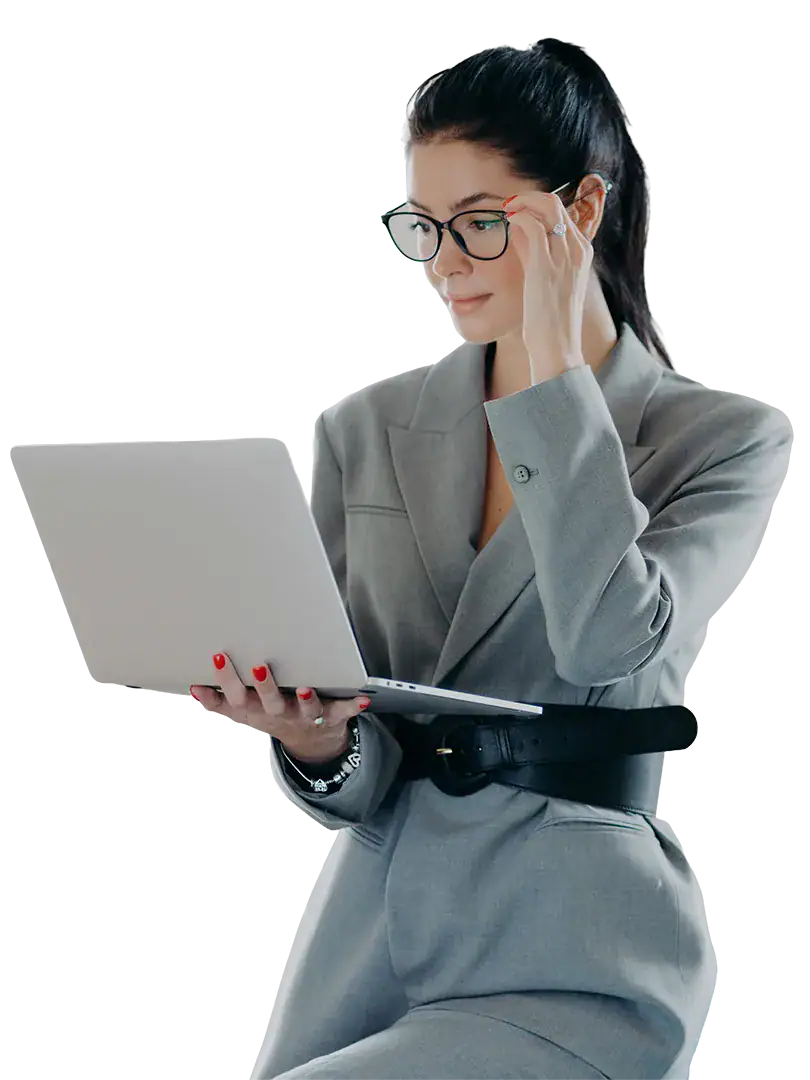 Modern professional woman working on a laptop, businesswoman focused on work, corporate career, concentration, technology, women in business.