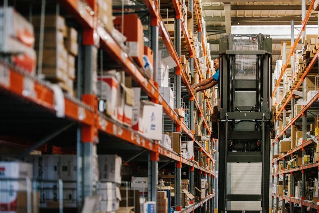 High-capacity warehouse with industrial shelving and storage racks for efficient inventory management.