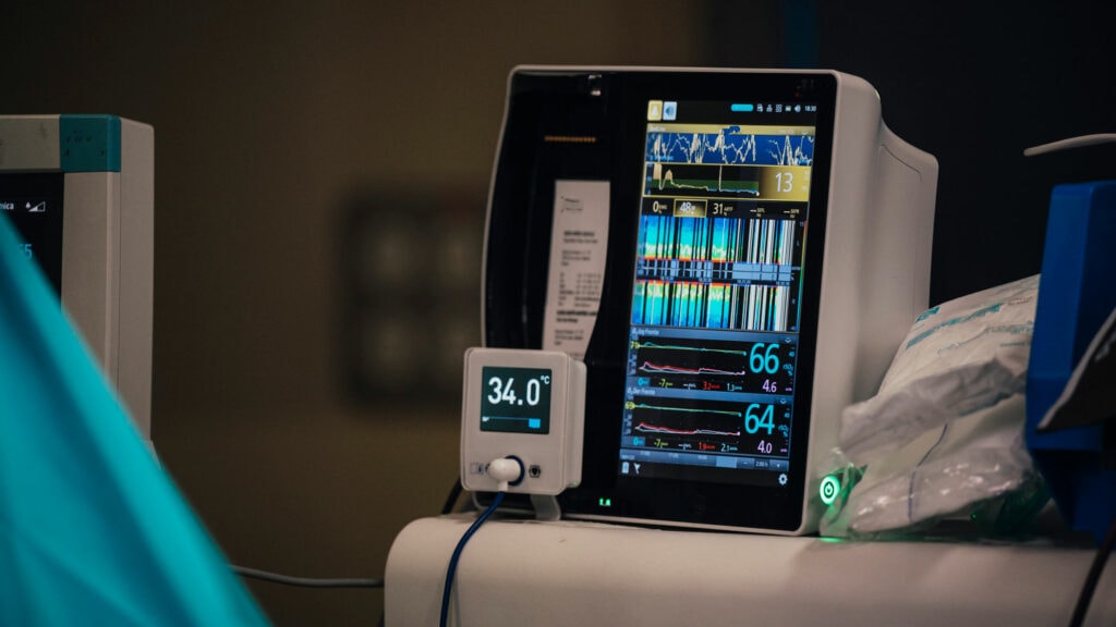 Healthy patient monitoring medical device, vital signs display, hospital ICU equipment, healthcare technology.