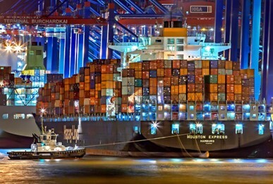 Cargo ship with containers at a port, maritime logistics, global shipping, transportation.