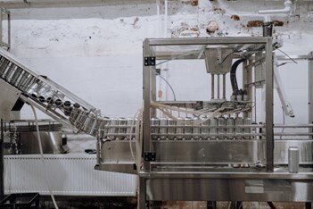 Automated beverage filling and capping machinery for efficient production.