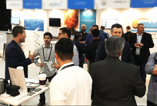 Advanced conference networking at Concentrus industry event with professionals engaging.