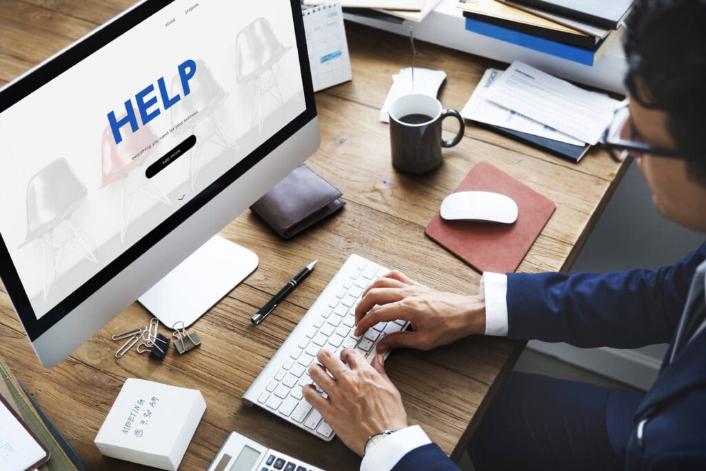 Help desk support for business website on desktop computer.