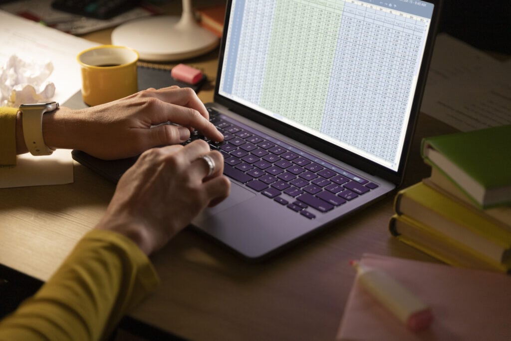 Efficient data analysis on a laptop for business insights and financial management.