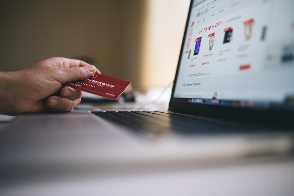 Secure online shopping with credit card on laptop screen at concentrated.com.