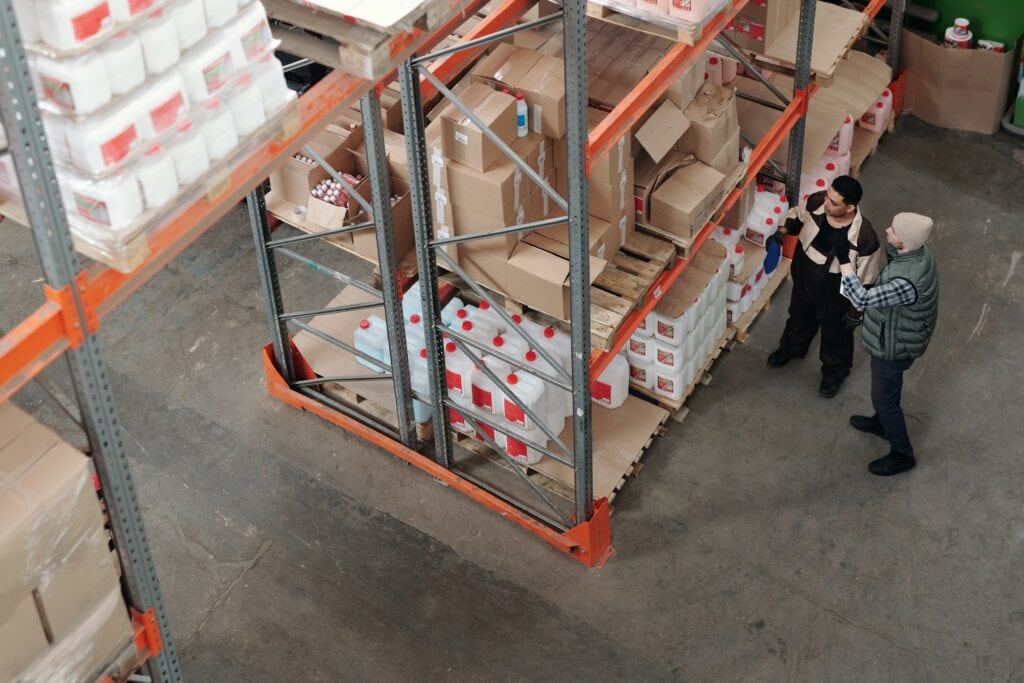 Efficient warehouse storage with boxed supplies and industrial shelving for logistics management.