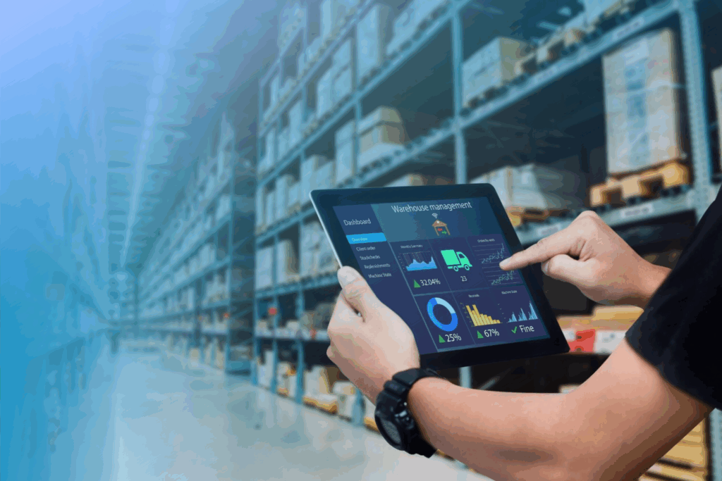 1. Warehouse management digital solutions on tablet in a modern fulfillment center.