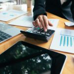 Businessman calculating financial data