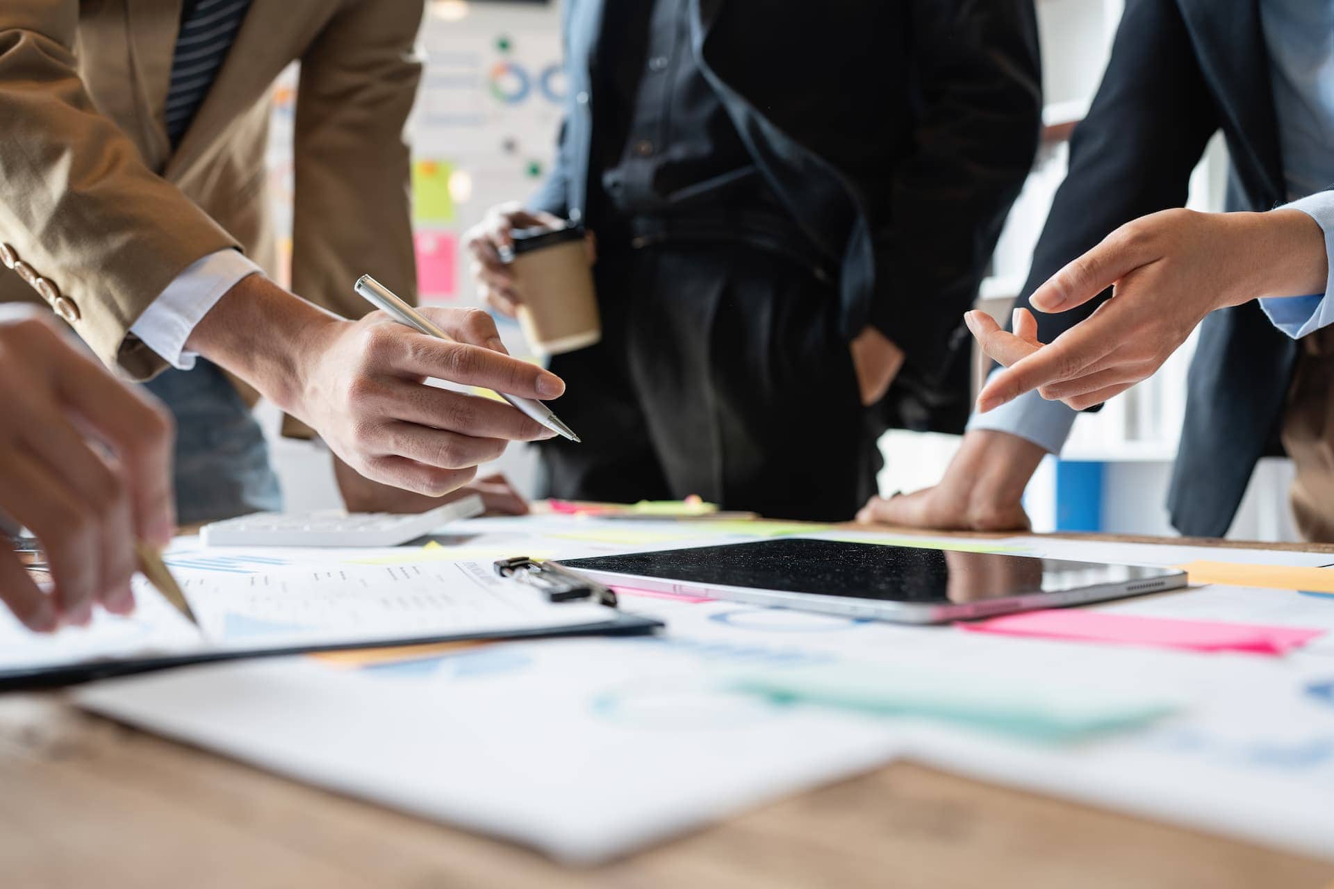 Collaborative business team discussing project strategies at conference table.