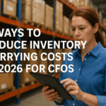 Inventory management professional reviewing stock data on a tablet in a warehouse.