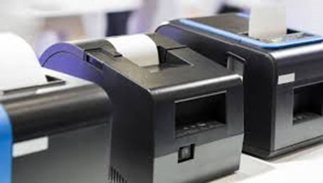 Thermal printer printing shipping labels for efficient order fulfillment in NetSuite.