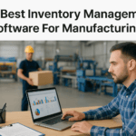 Manufacturing worker using inventory management software in factory setting.