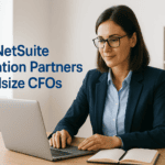 Businesswoman using laptop for NetSuite integration, finance, and CFO solutions.