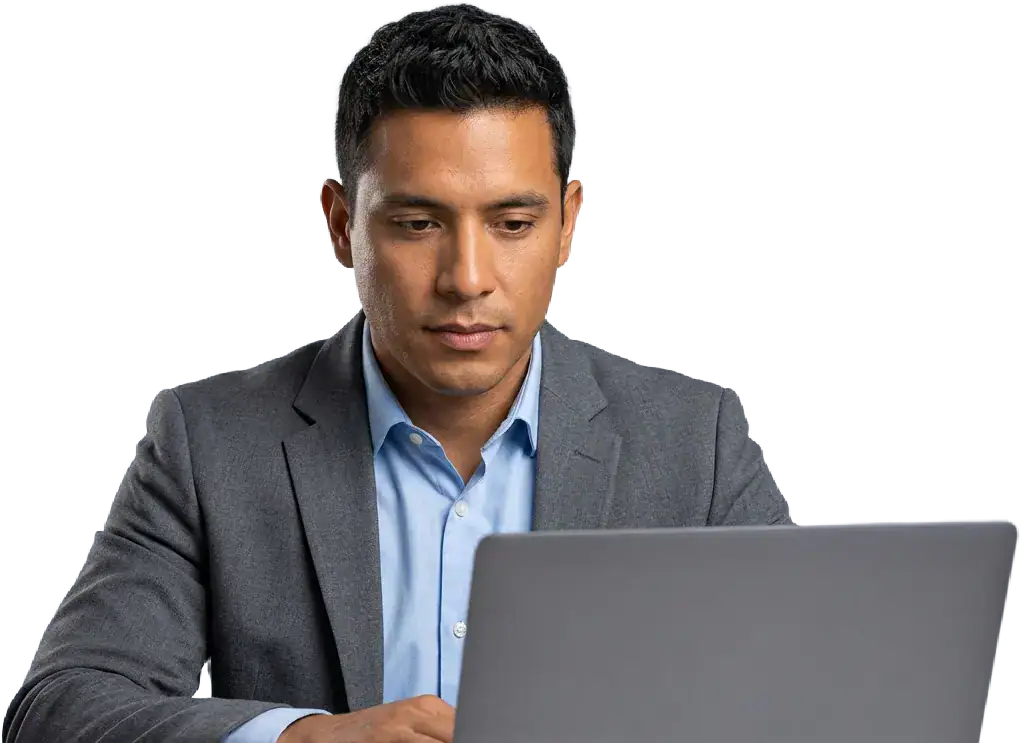 Business professional using a laptop, representing Concentrus solutions.