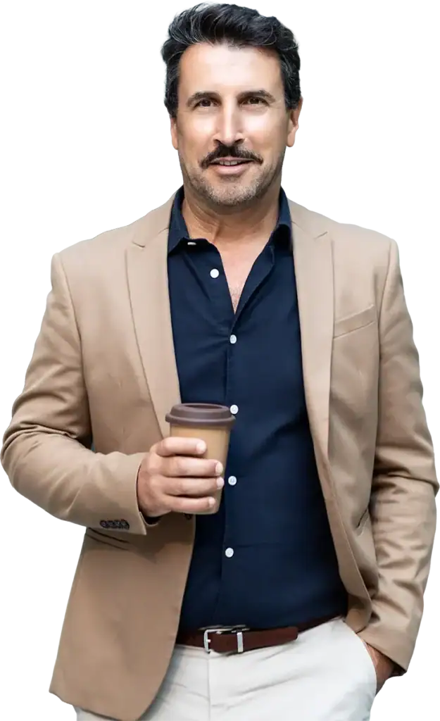 Professional man holding coffee cup, business attire, confident pose.