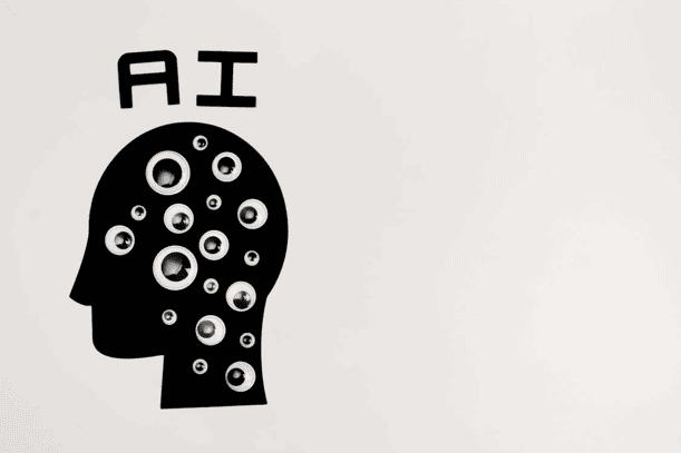 Silhouette of a human head with AI and data icons inside.