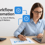 Businesswoman working on workflow automation with laptop and charts.